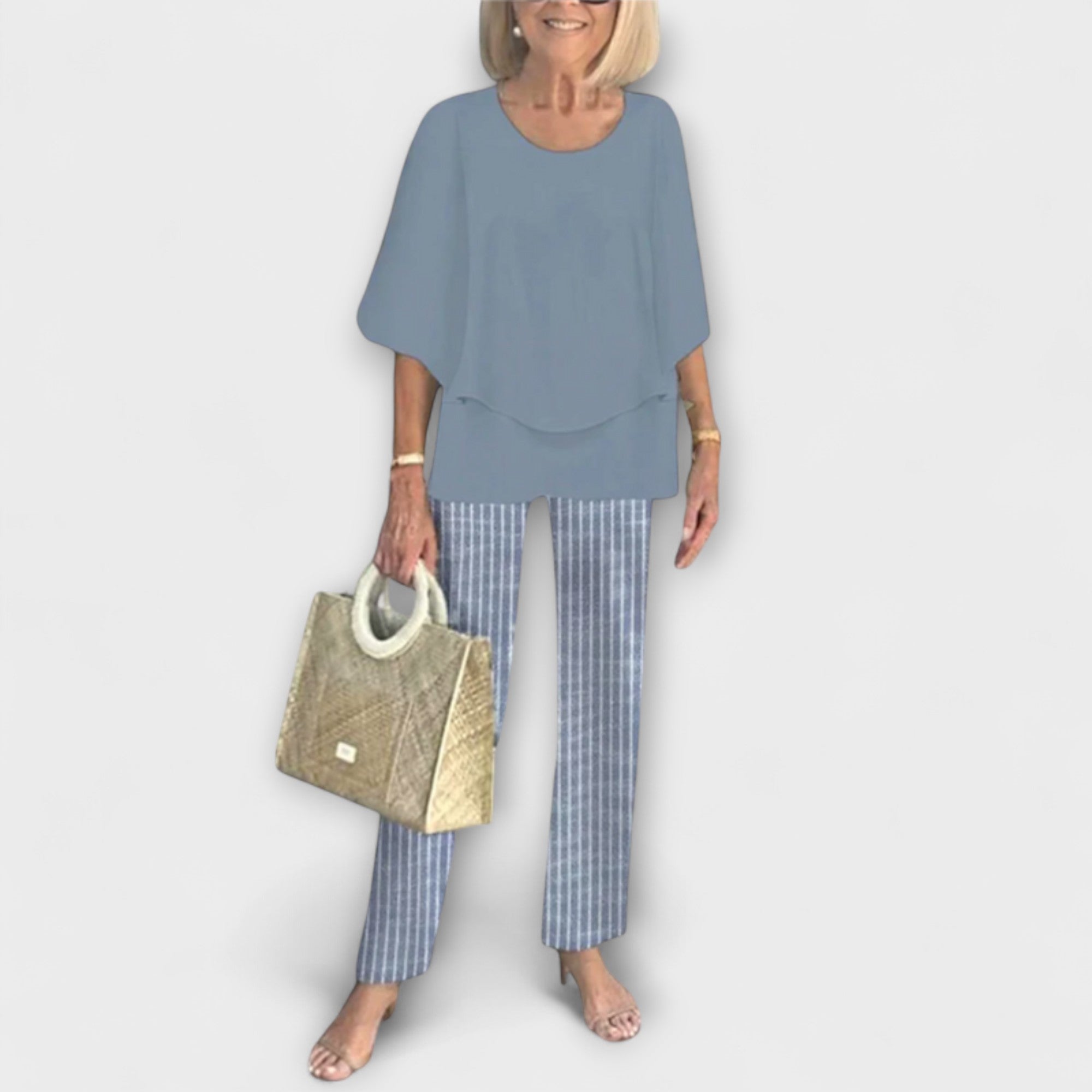 Conjunto moderno con blusa y pantalón cómodos LuvaModa