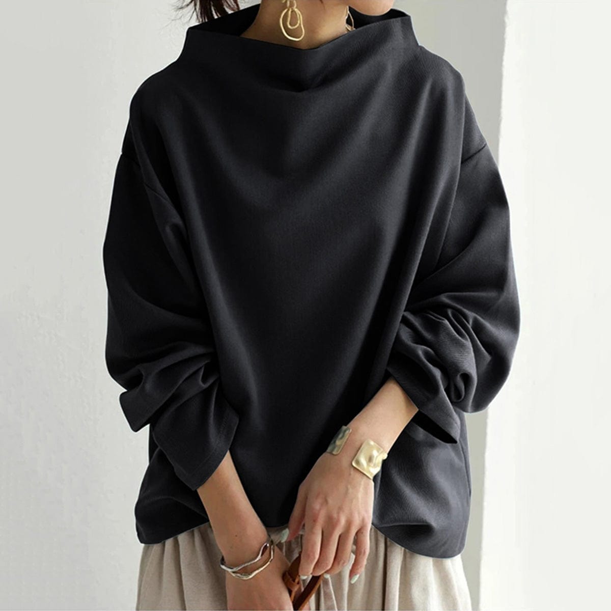Ellie | Top de punto con cuello alto y textura suave Luvamoda